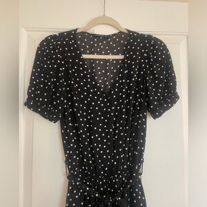 Black comfy jumpsuit with white dots.